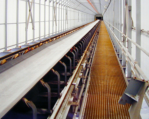 Yellow Molded Fiberglass Grating Walkway beside Conveyor at American Rock Salt Company