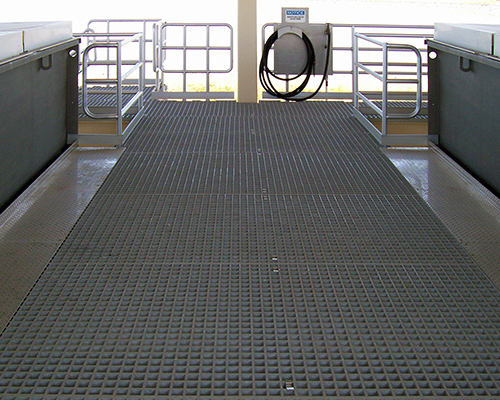 City of Lodi Pumping Station Walkway made of Light Gray Square Mesh Fiberglass Molding